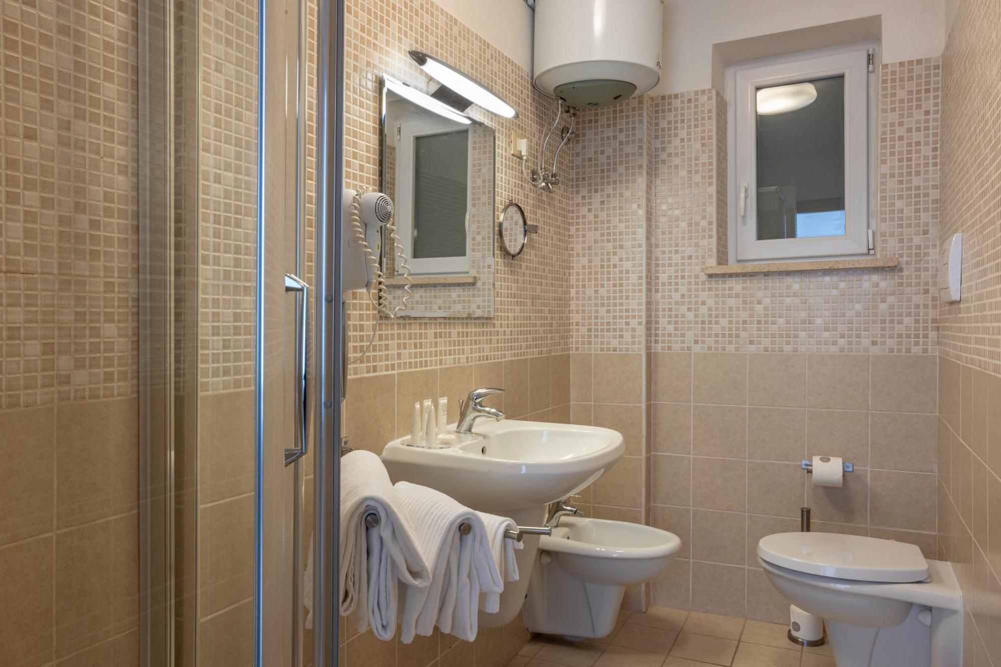 V Hotel Ancona Pokoj fotografie